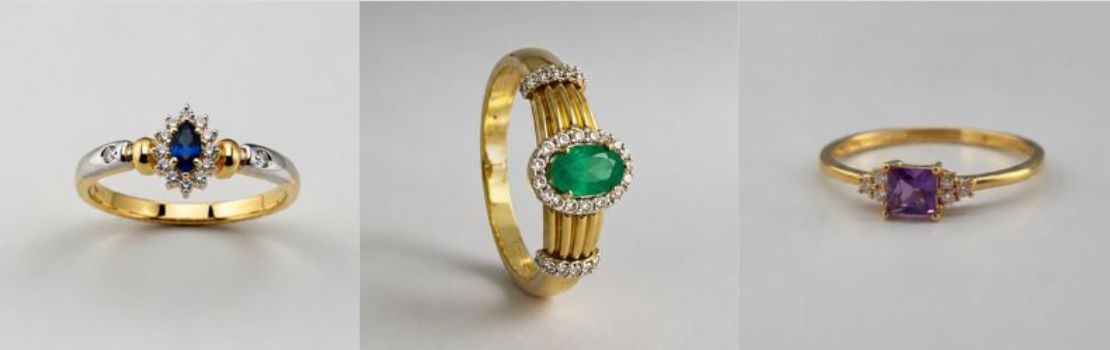 Imagem de capa do artigo A história das alianças: detalhe macro de um par de alianças de casamento sobre uma superfície elegante